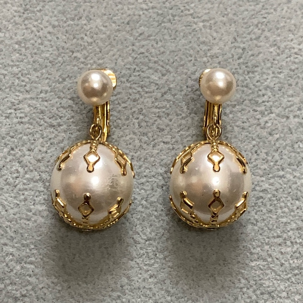 Celebrity gold tone faux pearl clip on earrings